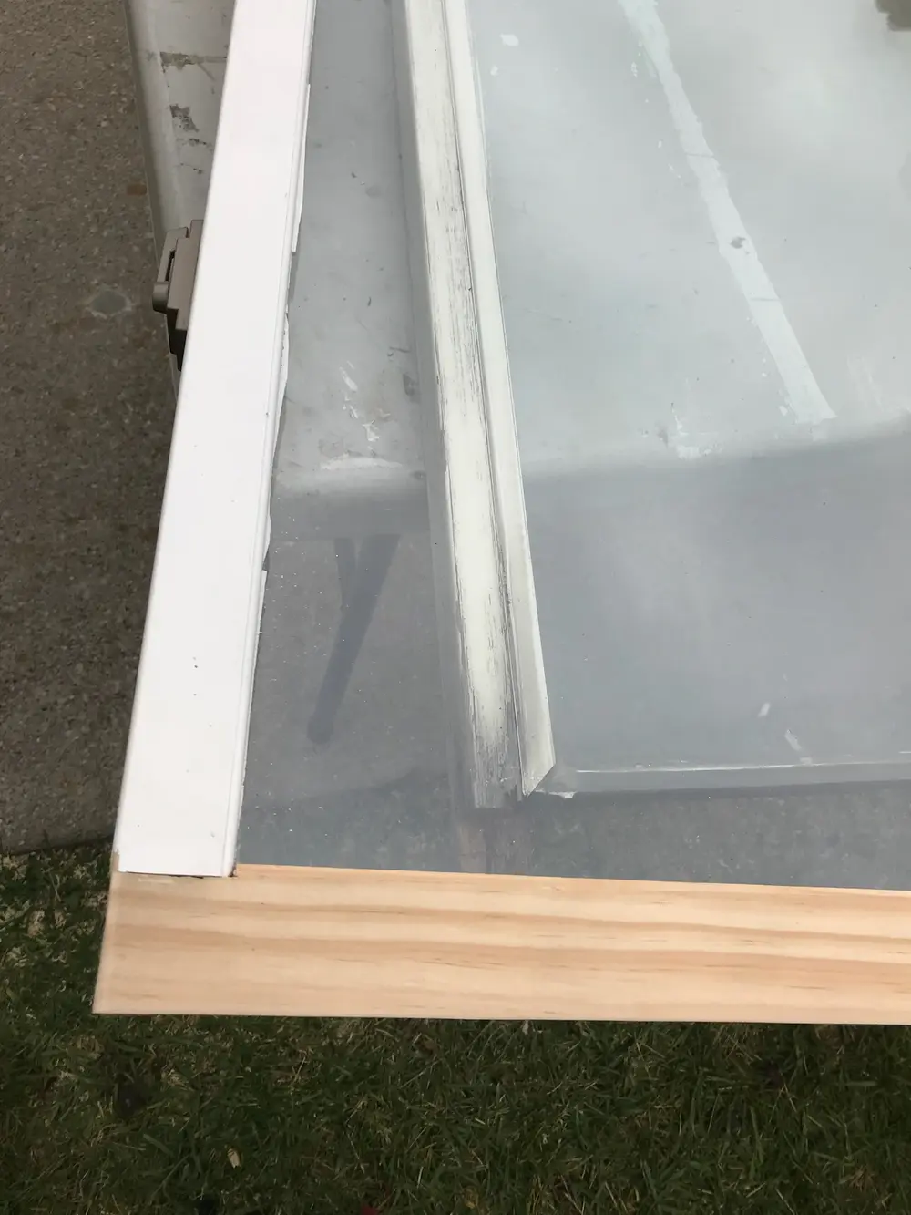 Window sash with a new wood bottom rail