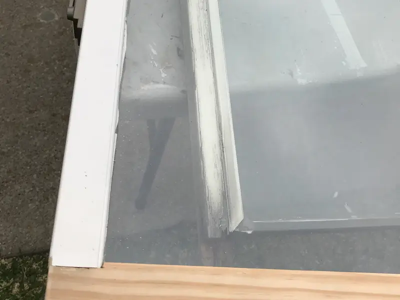 Window sash with a new wood bottom rail